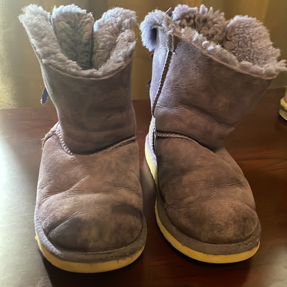 UGG Kids Boots With Bow.  Used, some rain/snow stains, No box, tread remains